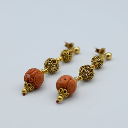 Pair of earrings composed of two worked and...