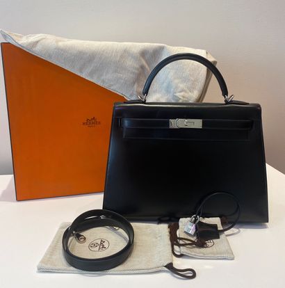 
HERMES. A black calf box leather sellier...