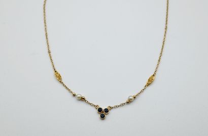 Yellow gold 750‰ necklace, centered with...