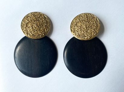 YVES SAINT LAURENT. Ear clips in gilded metal...