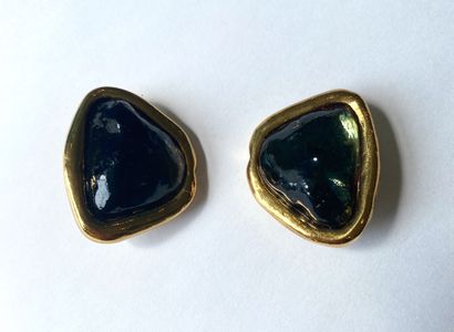 YVES SAINT LAURENT. Ear clips in gilded metal...