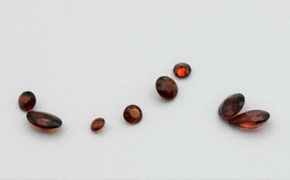 Lot of eight garnets (round, oval, pear)...