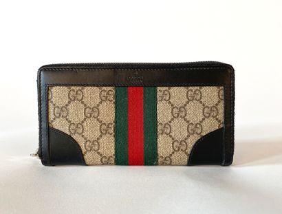 GUCCI. Ophidia wallet in Suprême GG canvas...
