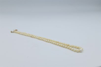 Yellow gold 750‰ drop cultured pearl necklace,...