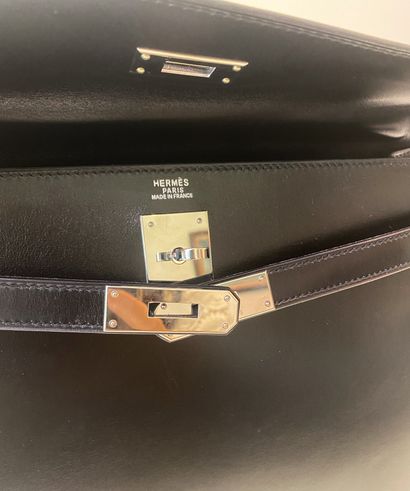 
HERMES. A black calf box leather sellier...