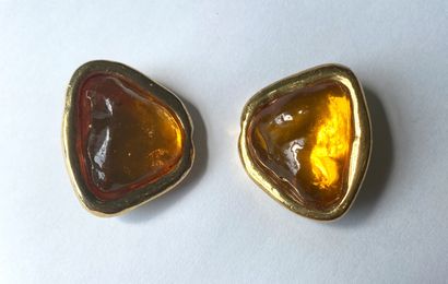 YVES SAINT LAURENT. Ear clips in gold-plated...