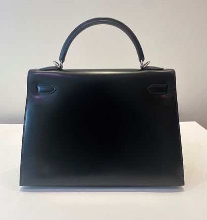
HERMES. A black calf box leather sellier...