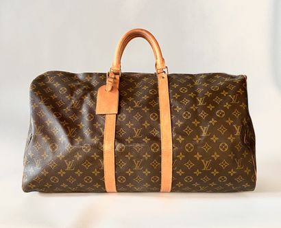 LOUIS VUITTON. Keepall bag in Monogram canvas...