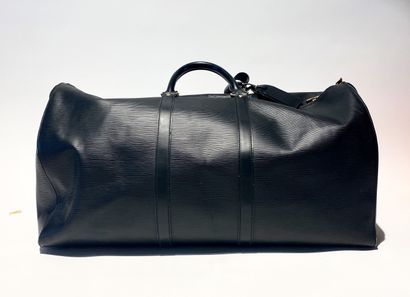 LOUIS VUITTON. Keepall 55 cm bag in black...