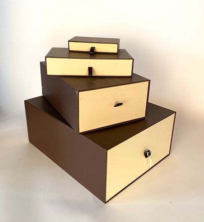 LOUIS VUITTON. Lot including a set of four...