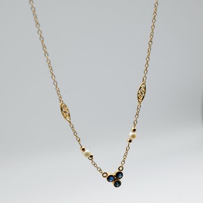 Yellow gold 750‰ necklace, centered with...