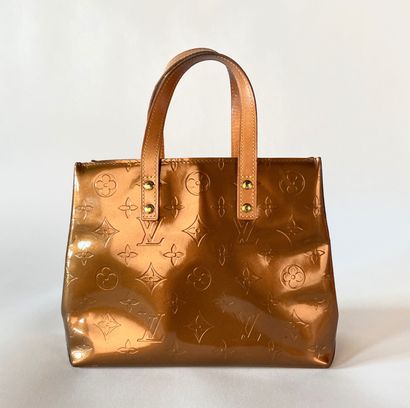 LOUIS VUITTON. Reade PM bag in Monogram patent...