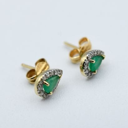 Pair of drop-shaped earrings adorned with...