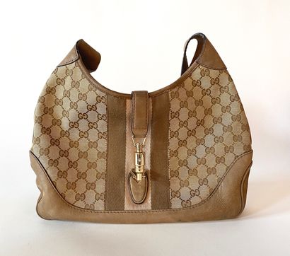 GUCCI. Jackie bag In beige GG canvas and...