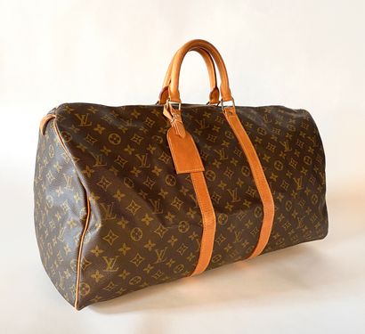 LOUIS VUITTON. Keepall bag in Monogram canvas...