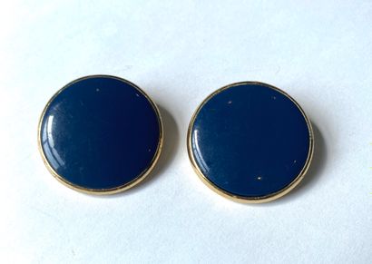 YVES SAINT LAURENT. Ear clips in gold metal...