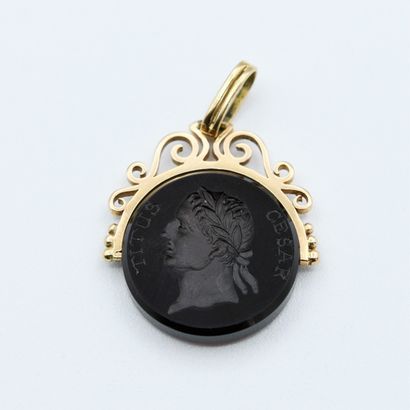 Pendant seal adorned with a sardine featuring...