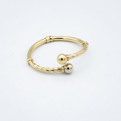 *Articulated bracelet in twisted yellow gold,...