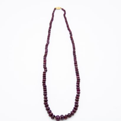 *Necklace of rolled ruby pearls in fall,...