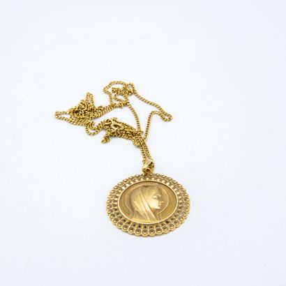 Chain and medal of the Virgin Mary in yellow...