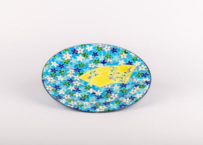 LONGWY, 

Assiette en faïence émaillée polychrome...