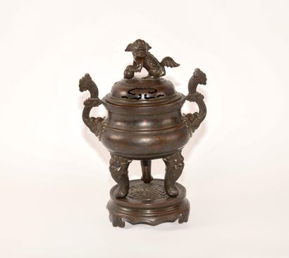 Inlaid bronze incense burner and base, the...
