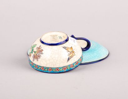 LONGWY, 

Tasse et sous-tasse en faïence...