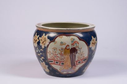 Large polychrome and gilded porcelain planter...