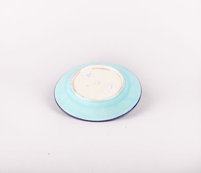 LONGWY, 

Assiette en faïence émaillée polychrome...