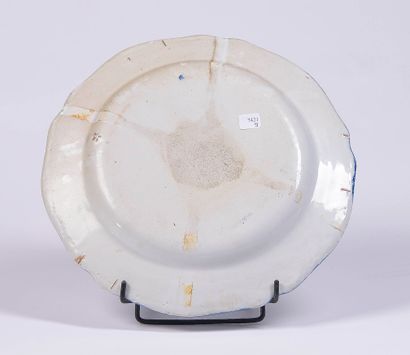 Large earthenware dish decorated with a twig...