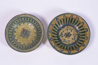 Two hollow dishes of polychrome enamelled...