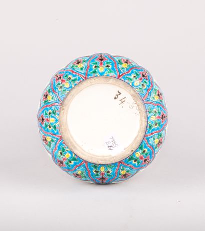 LONGWY,

Vase in polychrome enamelled earthenware...