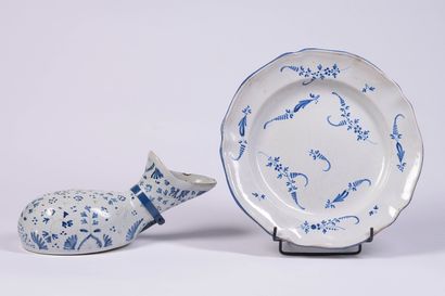 Large earthenware dish decorated with a twig...