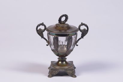 Medici-shaped silver cruet and its crystal...