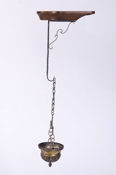Silver and wood wall hanging in the form...