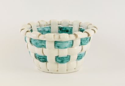 SAINTE RADEGONDE.
Ceramic basket with woven...