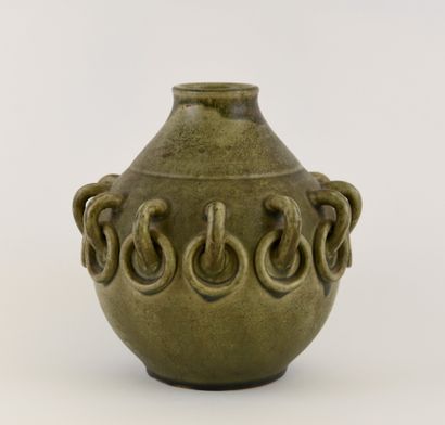 PRIMAVERA.
Green-glazed stoneware ball vase...