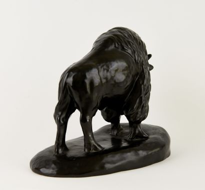 Black glazed ceramic subject featuring a...