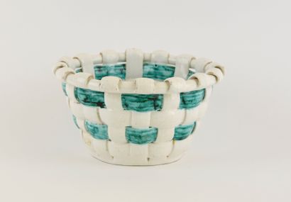 SAINTE RADEGONDE.
Ceramic basket with woven...
