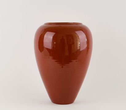 Oblong ceramic vase with red crackle glaze....