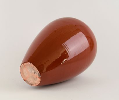 Oblong ceramic vase with red crackle glaze....