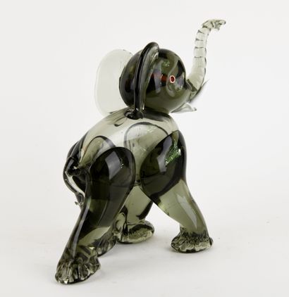 Elephant in polychrome stained glass. 
White...