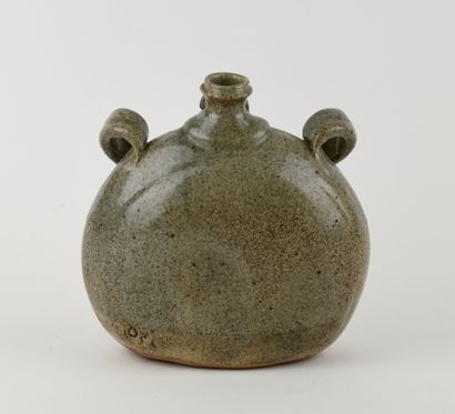 Stoneware anthropomorphic bottle with green...