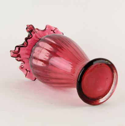 Rose-tinted glass baluster vase with hemmed...