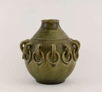 PRIMAVERA.
Green-glazed stoneware ball vase...