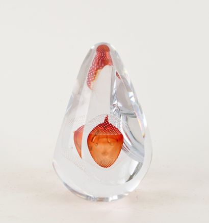 Egg-shaped crystal paperweight with cut sides...
