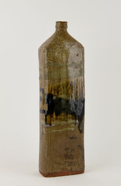 MENELIKA (Swiss)
Stoneware bottle vase with...