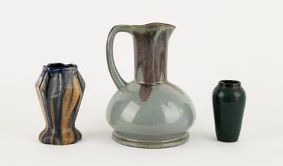 Reunion of two ceramic vases and one pitcher,...