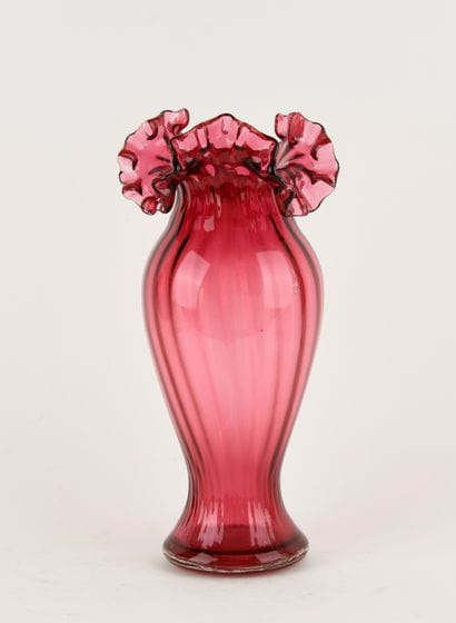 Rose-tinted glass baluster vase with hemmed...