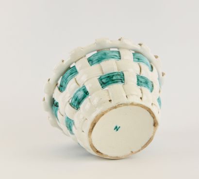 SAINTE RADEGONDE.
Ceramic basket with woven...